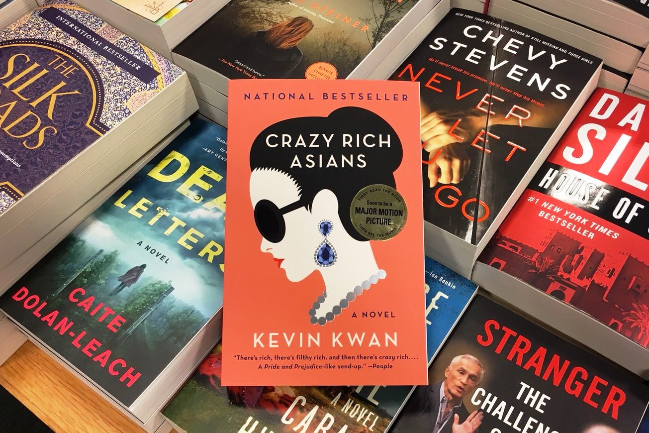 Read Crazy Rich Asians by Kevin Kwan before August